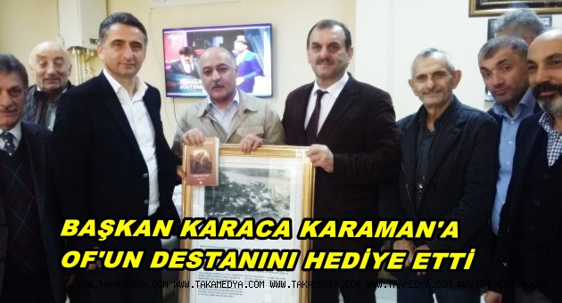 BAŞKAN KARAMAN'A OF'UN DESTANINI HEDİYE ETTİ