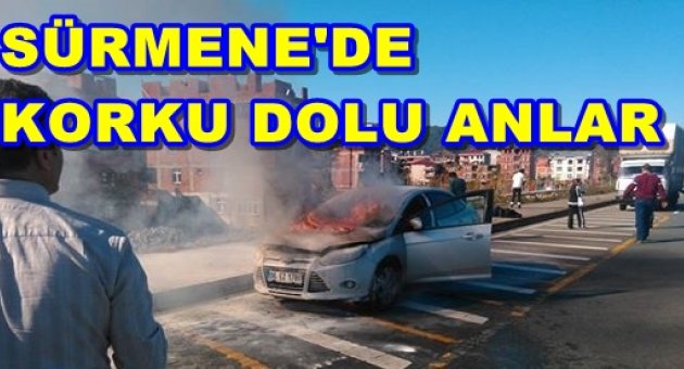 SÜRMENE'DE ARAÇ İÇİNDE YANMAKTAN KURTARILDI