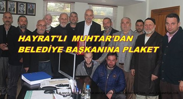 TRABZON'DA MUHTARDAN BAŞKANA PLAKET